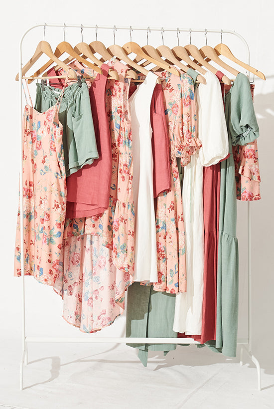 Image of a rack of different clothes hanging