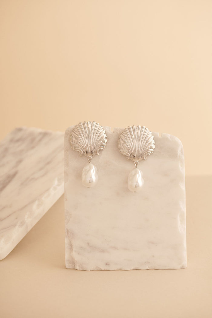 Soiree Drop Shell Earrings in Silver with Pearl focus shoot flatlay