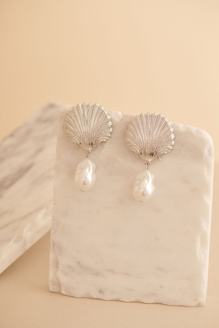Soiree Drop Shell Earrings in Silver with Pearl focus shoot flatlay