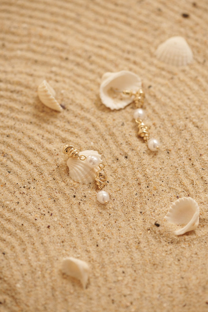 Vera Drop Earrings in 18K Gold Sculpted Pearl focus shoot flatlay