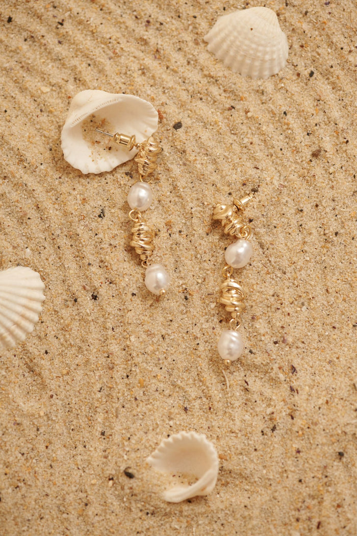 Vera Drop Earrings in 18K Gold Sculpted Pearl focus shoot flatlay
