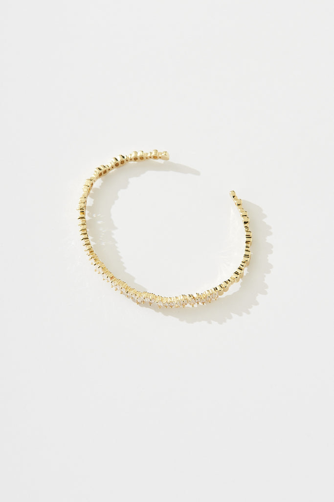 August + Delilah Eglisse Bangle In Gold With Diamante - flatlay