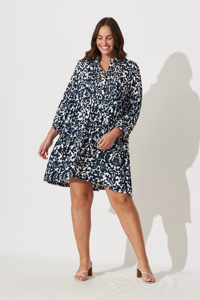 Caracelle Smock Dress In White With Navy Print - full length