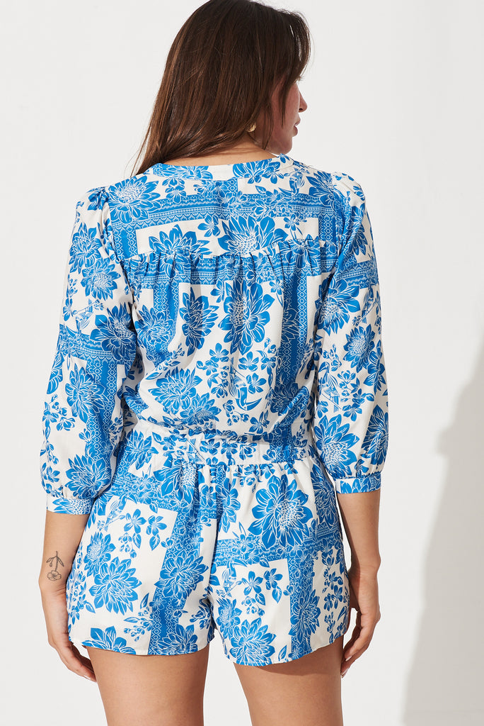 Felicity Playsuit In White With Blue Floral Print - back