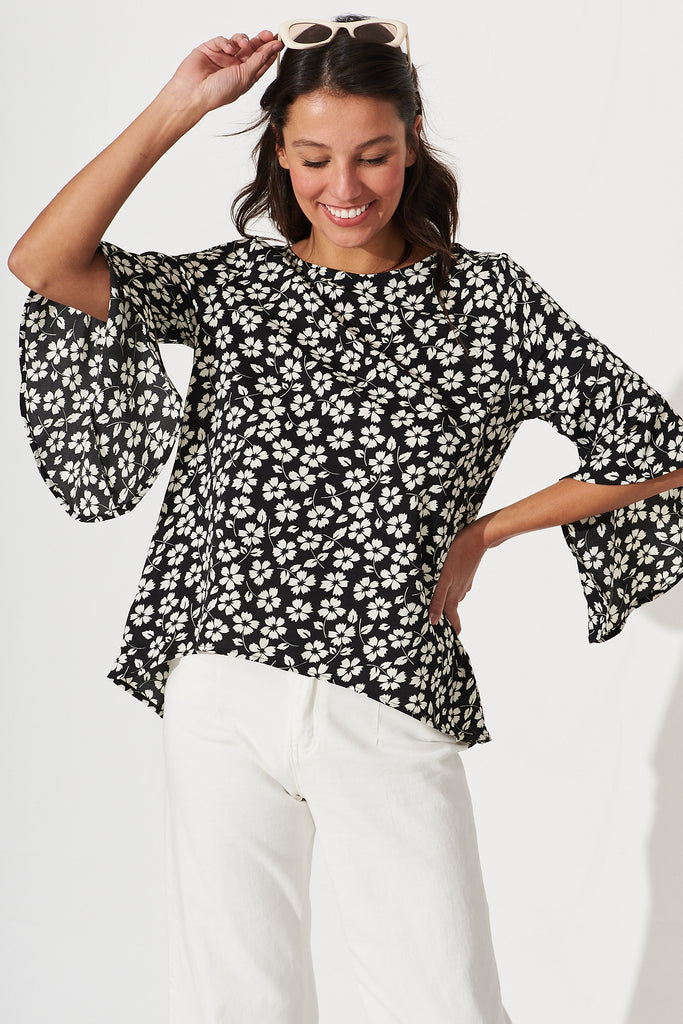 Nila Top In Black With White Floral Print - front