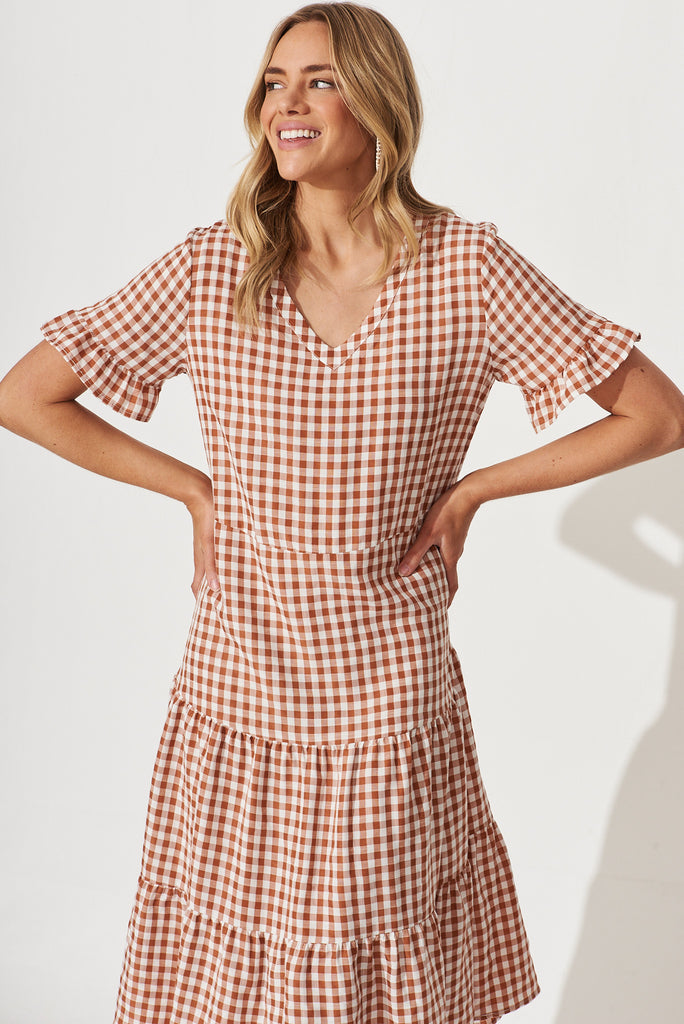 Louisa Midi Smock Dress In Rust And White Gingham Cotton Blend - front