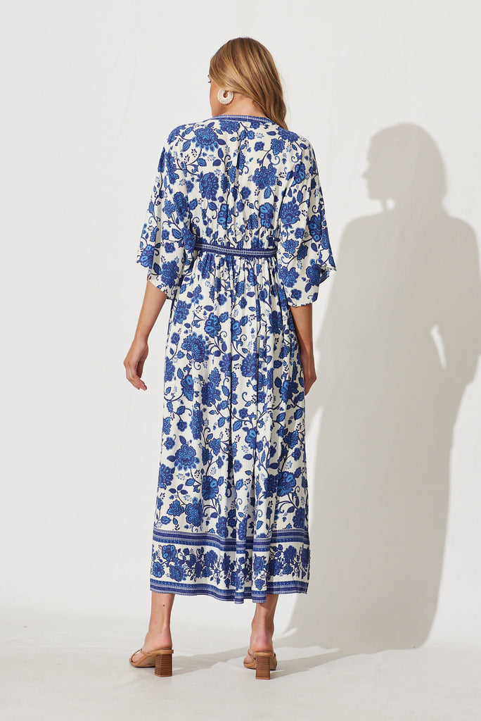 Break Free Maxi Dress In Cream With Blue Floral Border Print - back