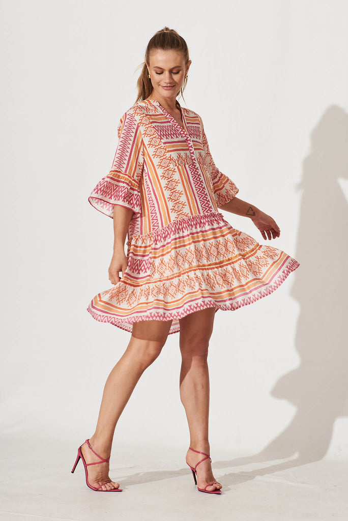 Tesoro Smock Dress In Pink And Orange Aztec Print