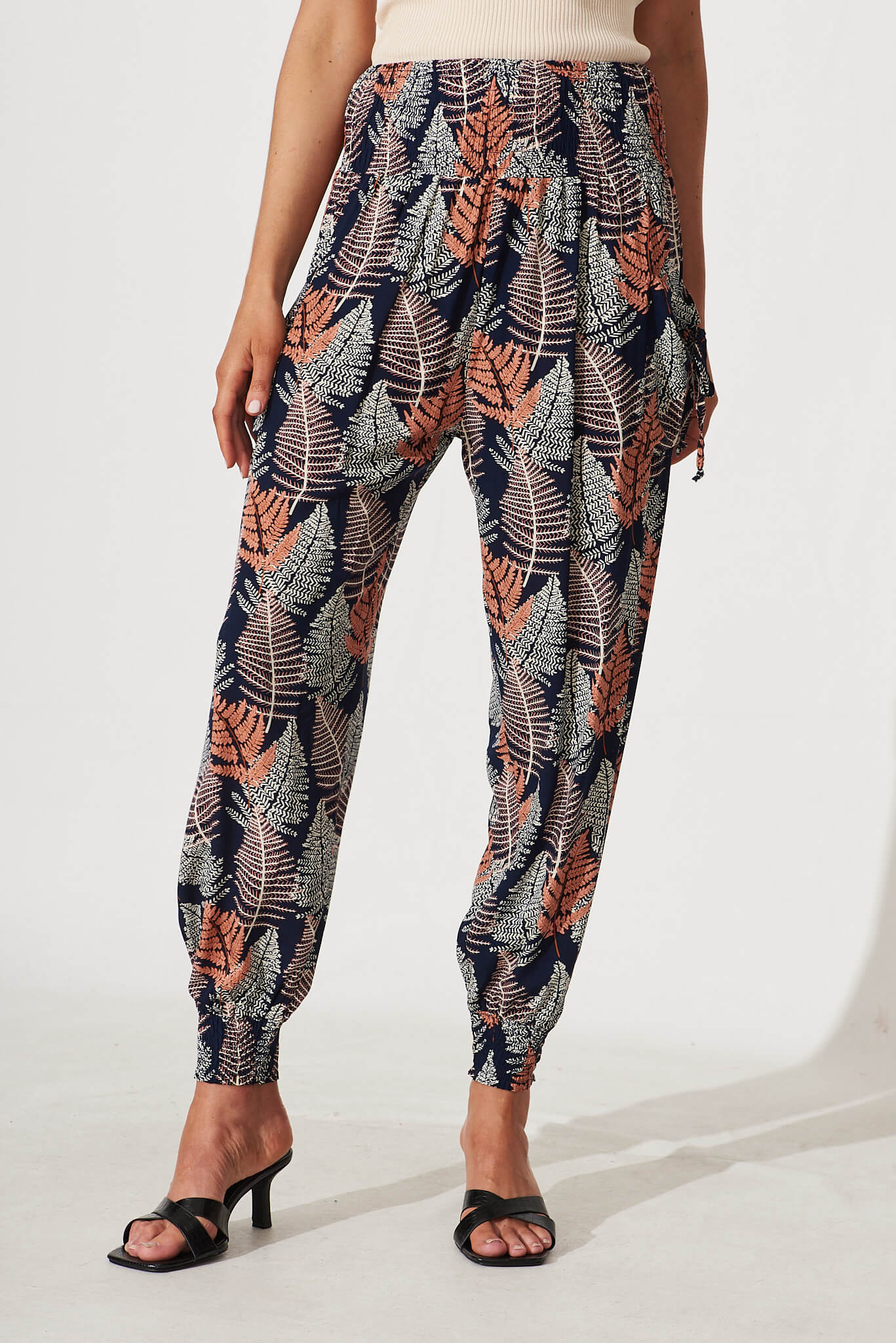 Gabby Pant In Navy With Multi Leaf Print - front