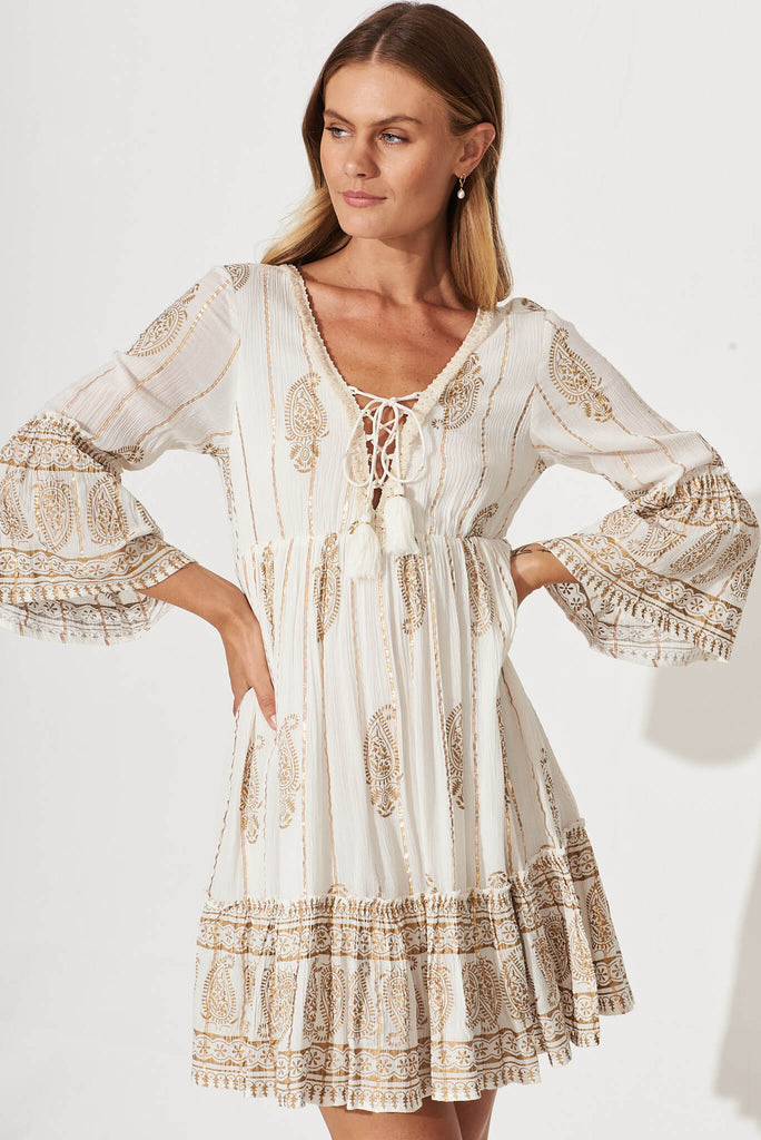 Elliott Dress In White With Gold Print - front