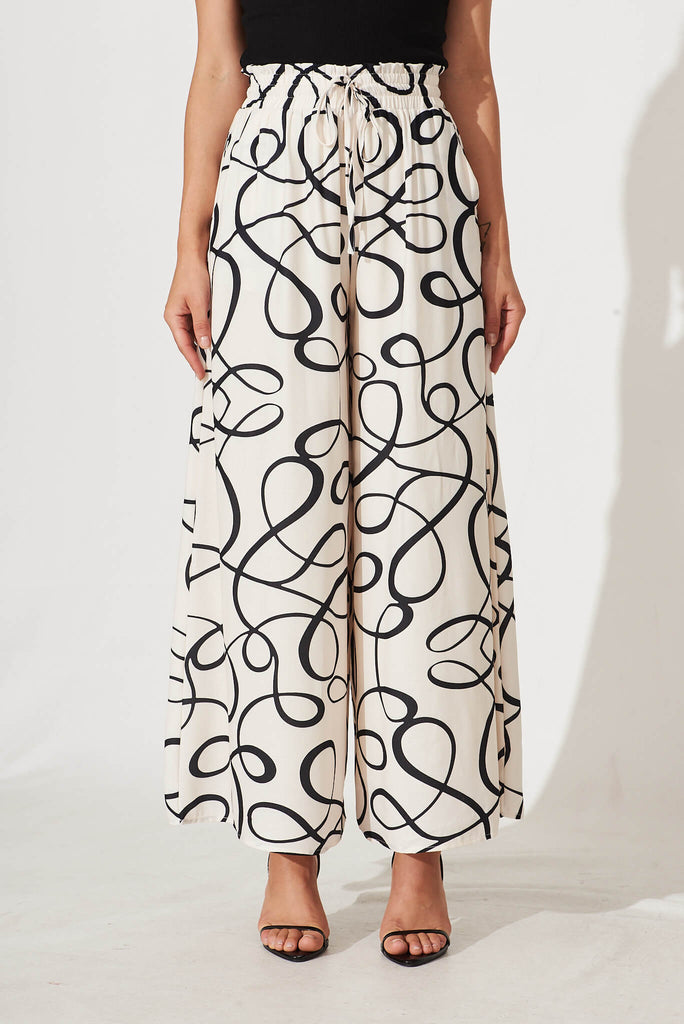 Goldie Wide Leg Pant In Cream With Black Swirl Print - front