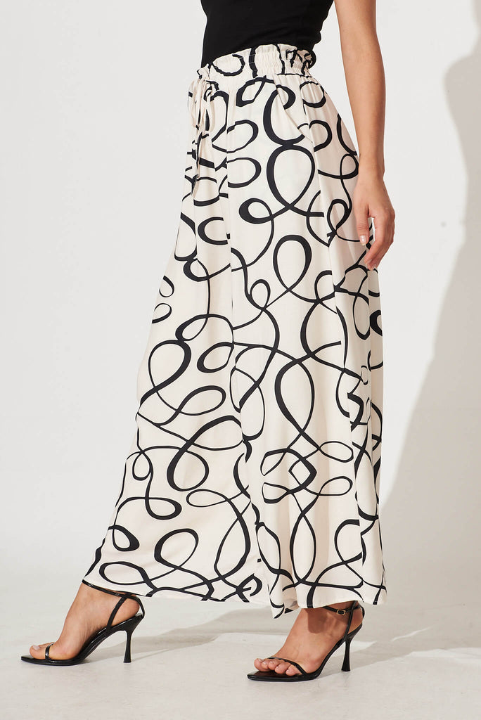 Goldie Wide Leg Pant In Cream With Black Swirl Print - side