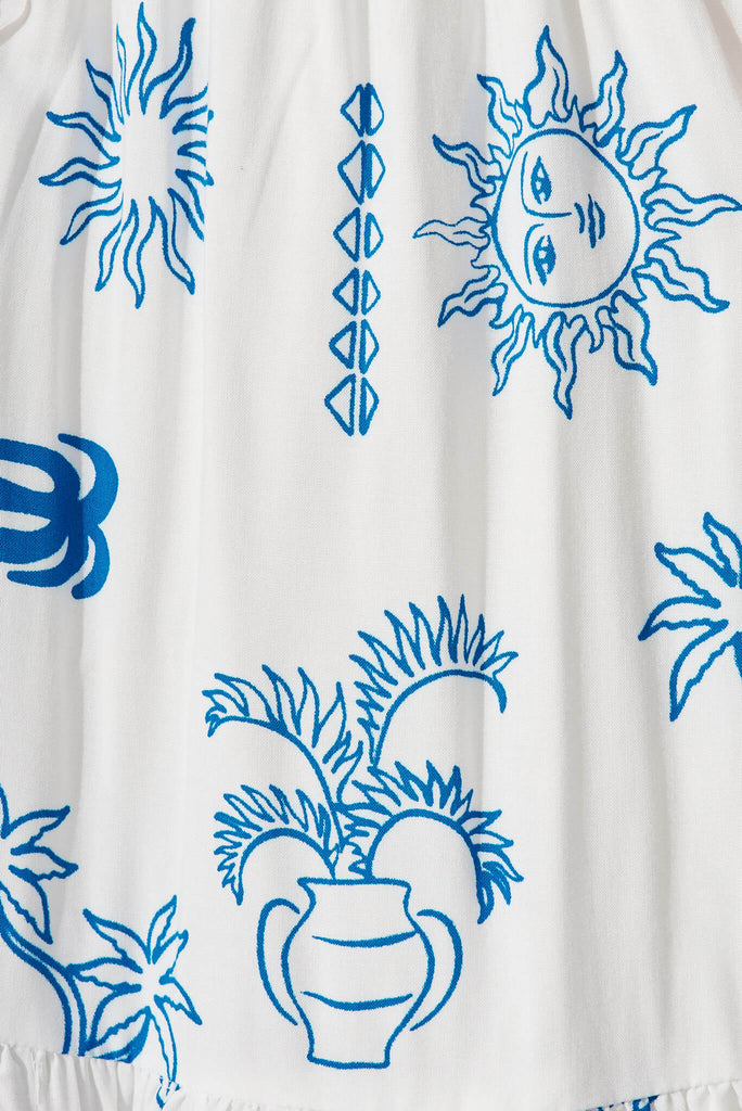 Poolside Dress In White With Blue Sun Print - fabric