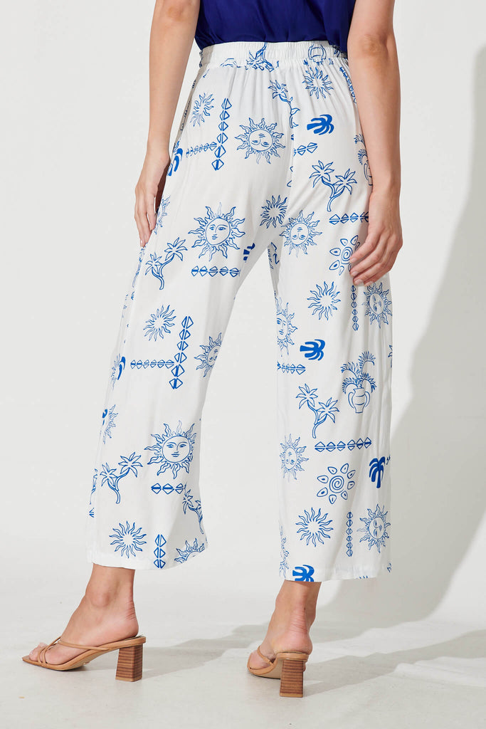 Castaway Pant In White With Blue Sun Print - back