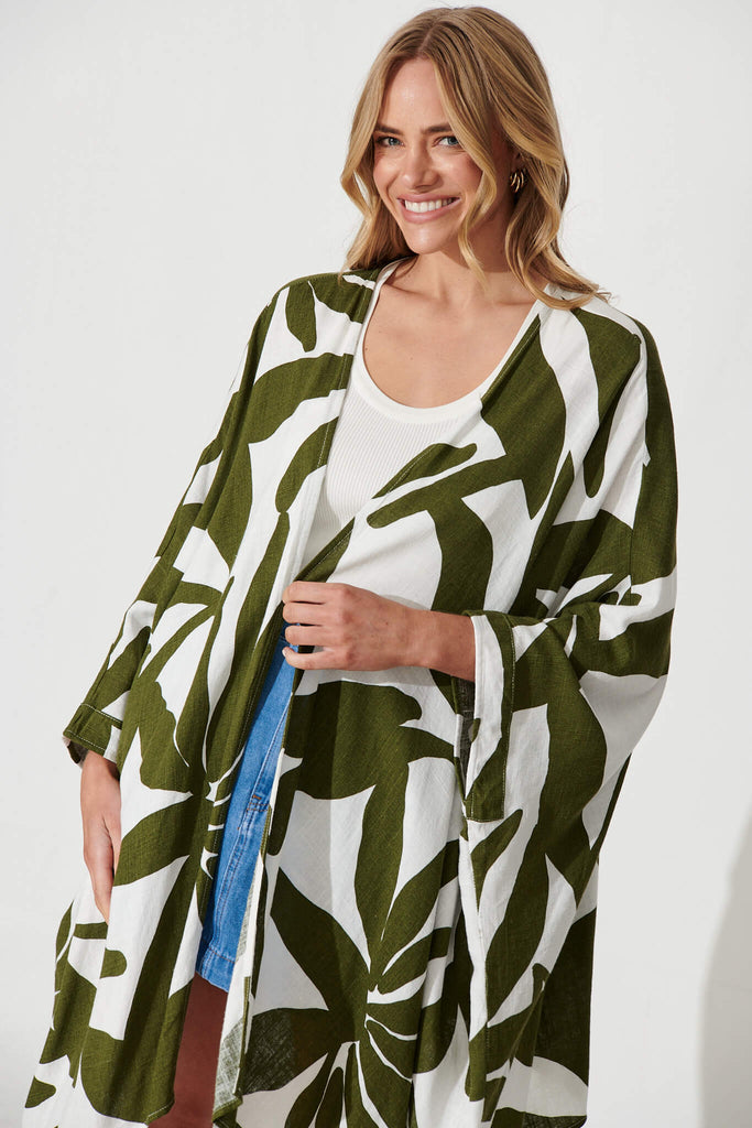 Heron Cape In Cream And Green Geo Print - front