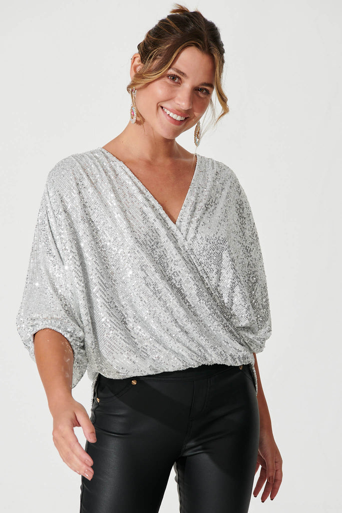 Celebration Sequin Mock Wrap Top In Silver - front