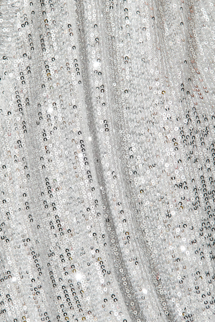 Celebration Sequin Mock Wrap Top In Silver - fabric