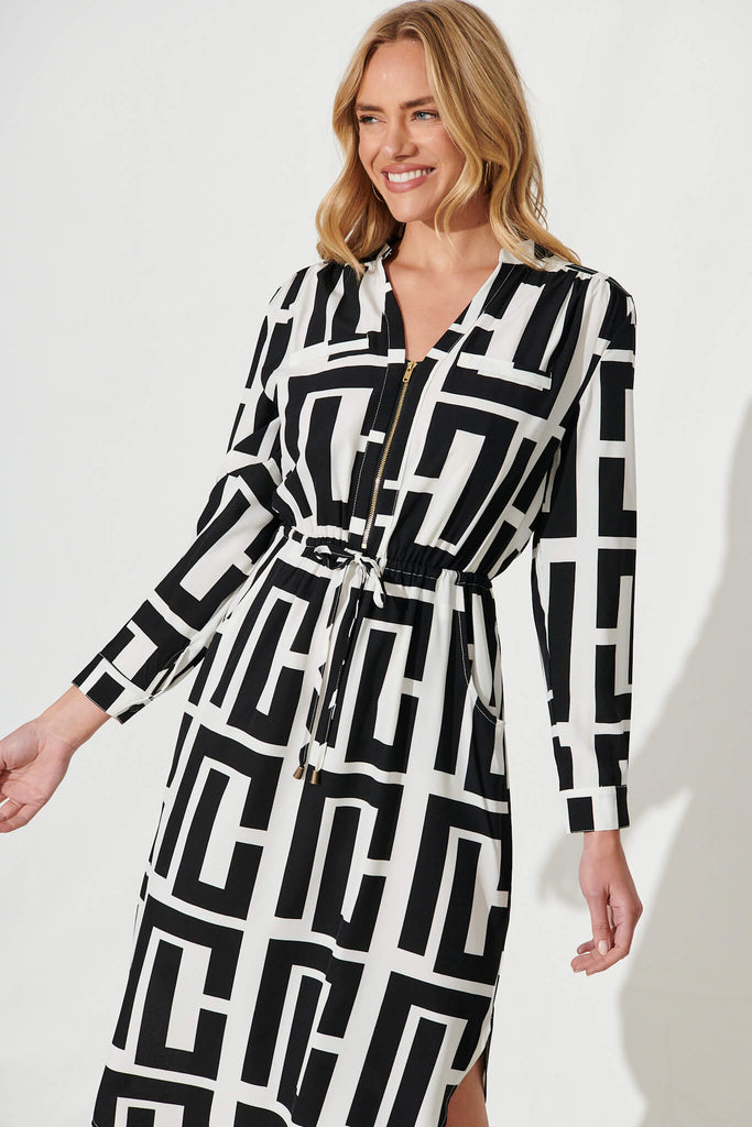 Rival Zip Dress In Black And White Geometric Print - front