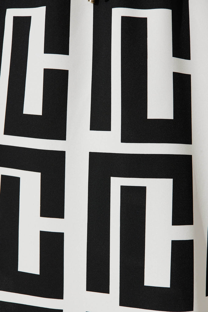 Rival Zip Dress In Black And White Geometric Print - fabric