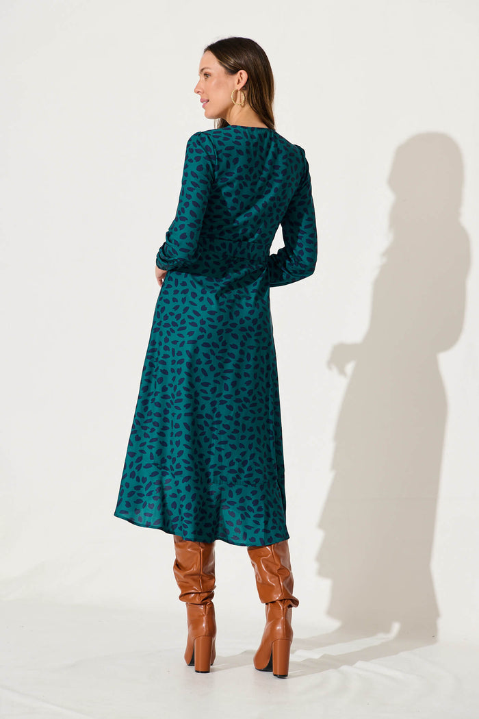 Mabo Midi Dress In Teal With Navy Leaf - back
