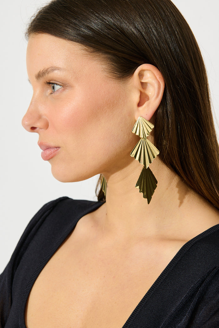 Ruby Drop Earrings in Gold on model side