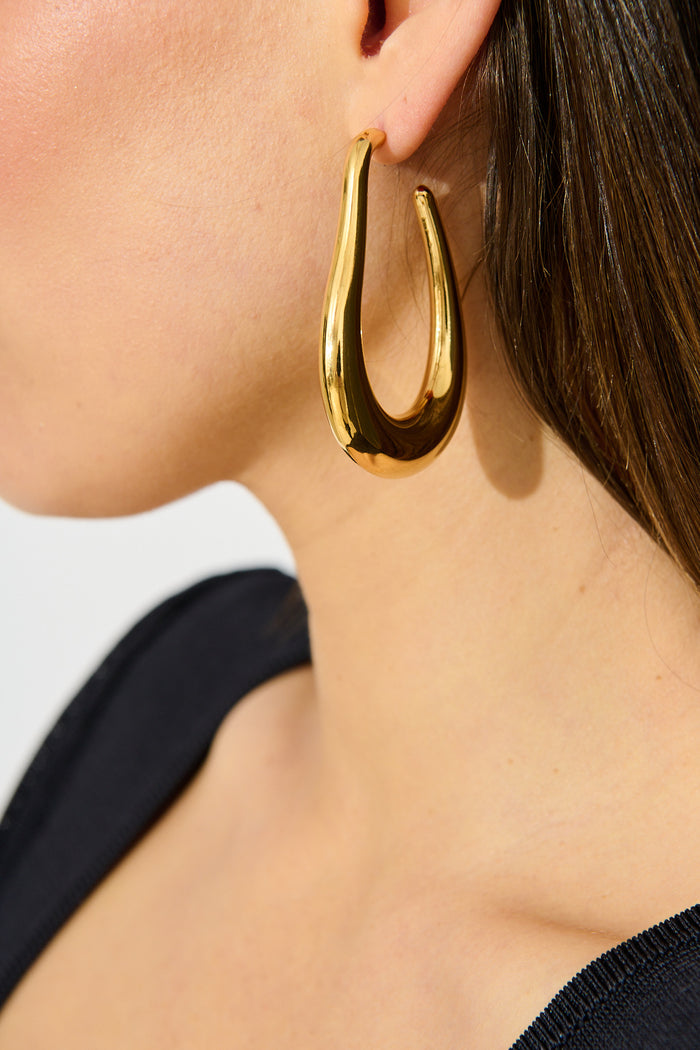 Shayla Hoop Earrings in 18K Gold Plated on model side cropped