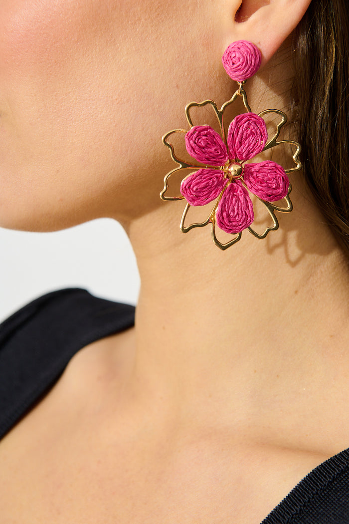 Pia Drop Earrings in Gold with Pink Rattan on model side cropped