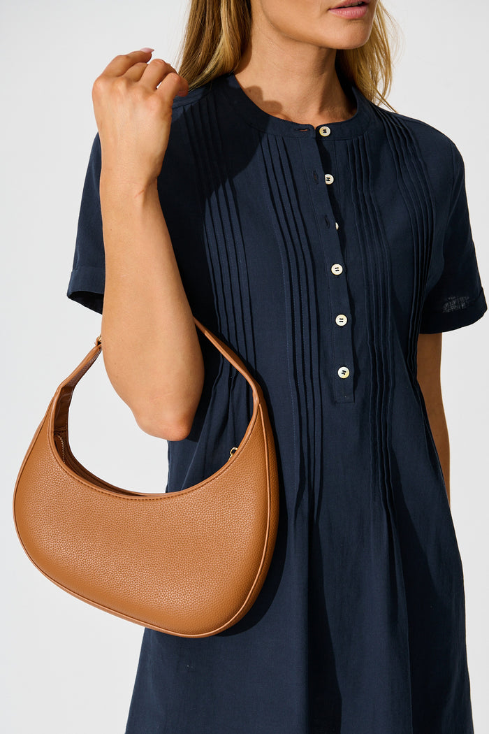 Amber Mini Shoulder Bag in Tan PU on model front