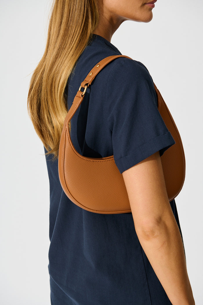 Amber Mini Shoulder Bag in Tan PU on model side
