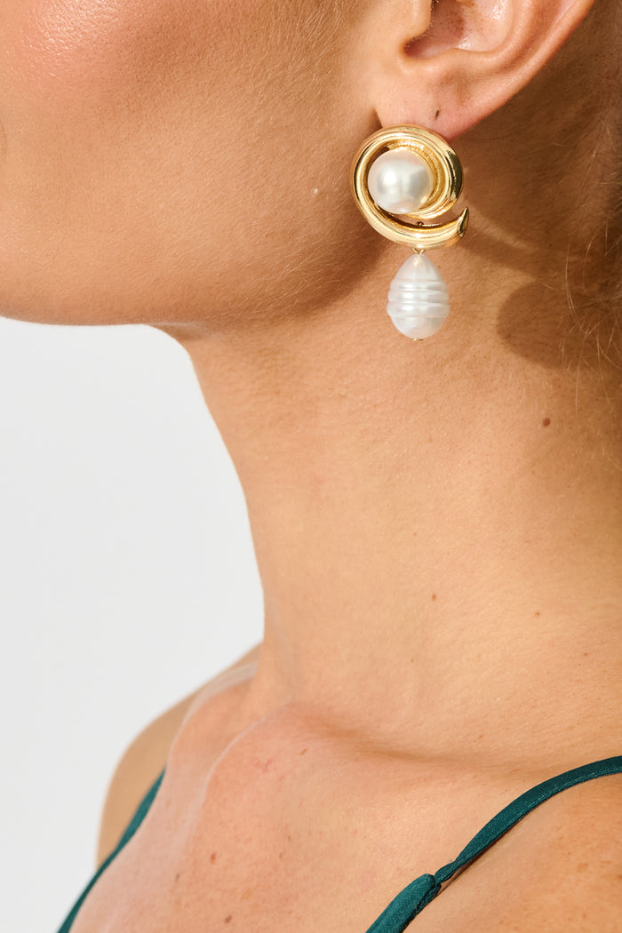 Daniella Drop Earrings in Gold with Pearl on model detail