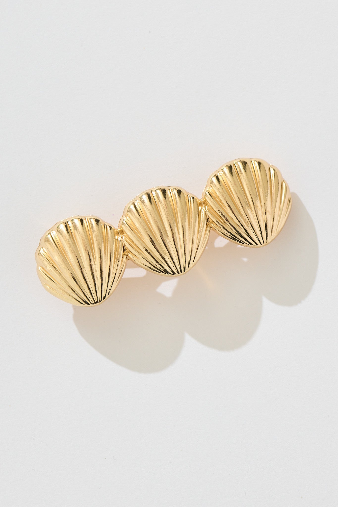 Shelly Barrette Hair Clip in Gold flatlay
