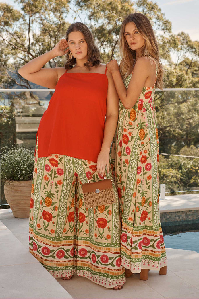 Isla Tropic Pant in Pineapple Print campaign two models