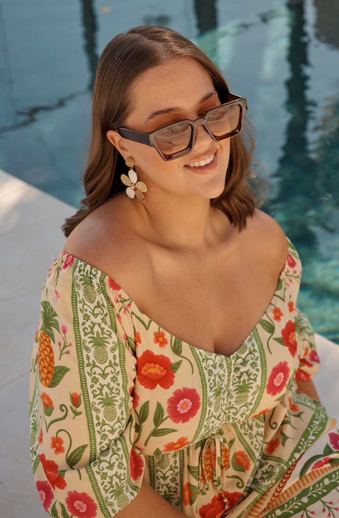 Jury Rectangular Sunglasses in Brown campaign on model front