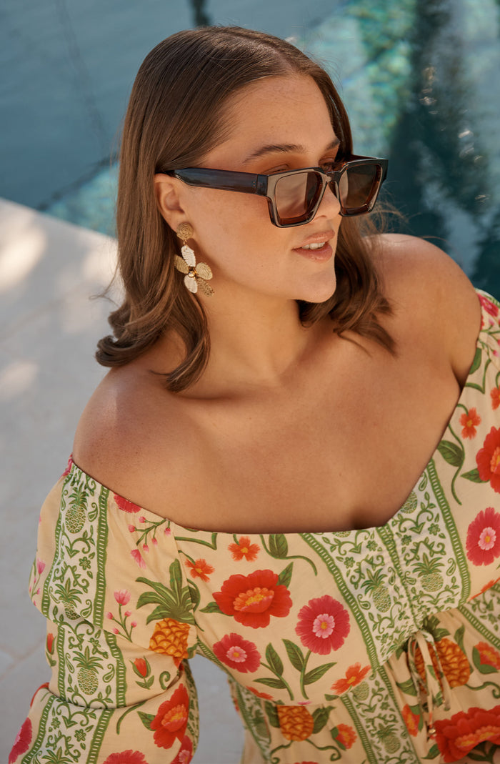 Jury Rectangular Sunglasses in Brown campaign on model side