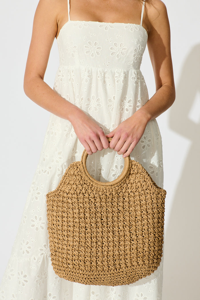 Anouk Circle Handle Tote Bag in Natural Raffia on model front