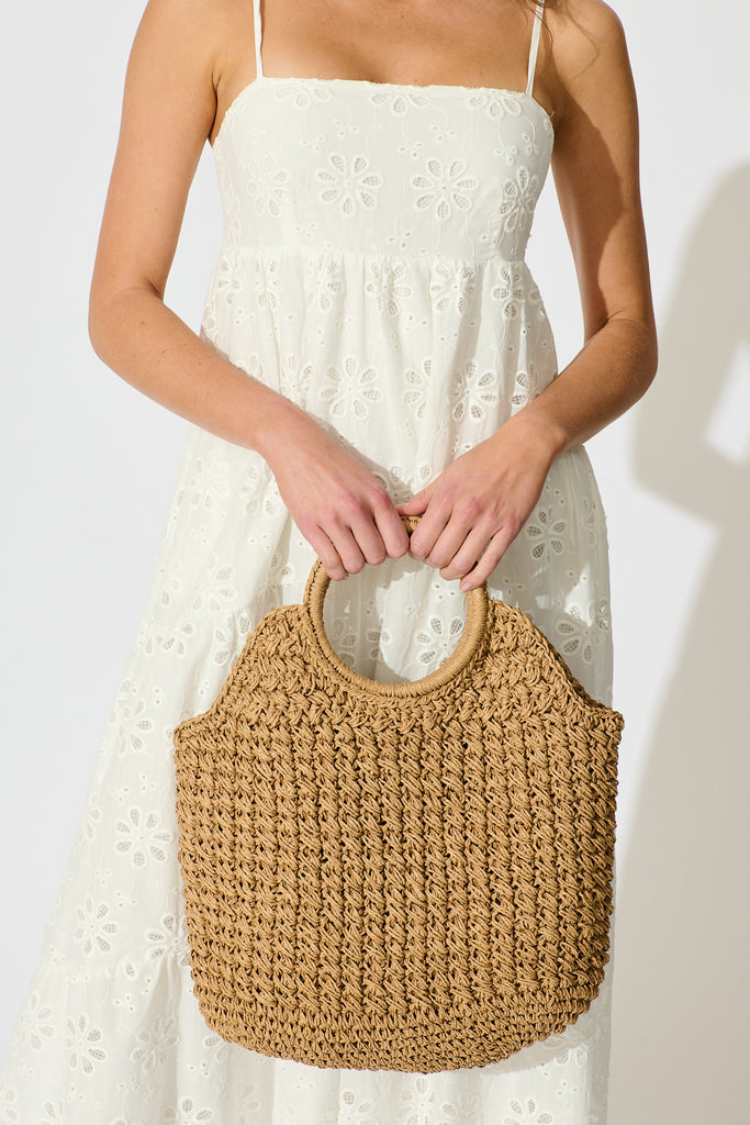 Anouk Circle Handle Tote Bag in Natural Raffia on model front