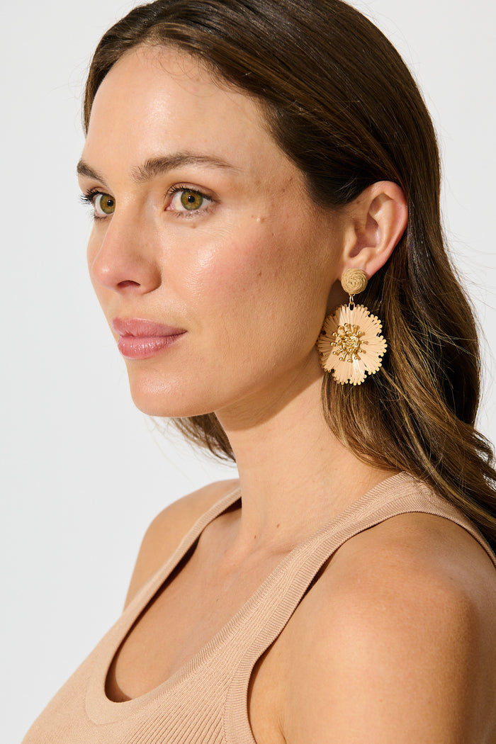 Anais Drop Earrings in Blush Raffia with Gold Accent on model side