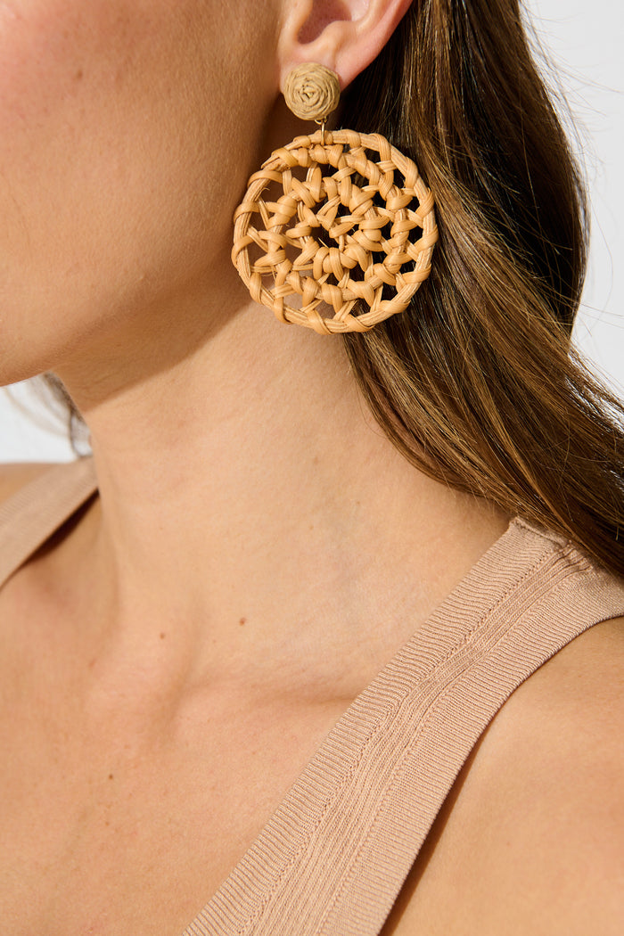 Leana Drop Earrings in Natural Raffia with Gold Accent on model side close up