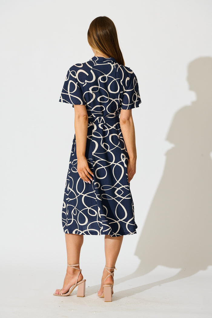Fergie Midi Dress in Navy Geometric Print back
