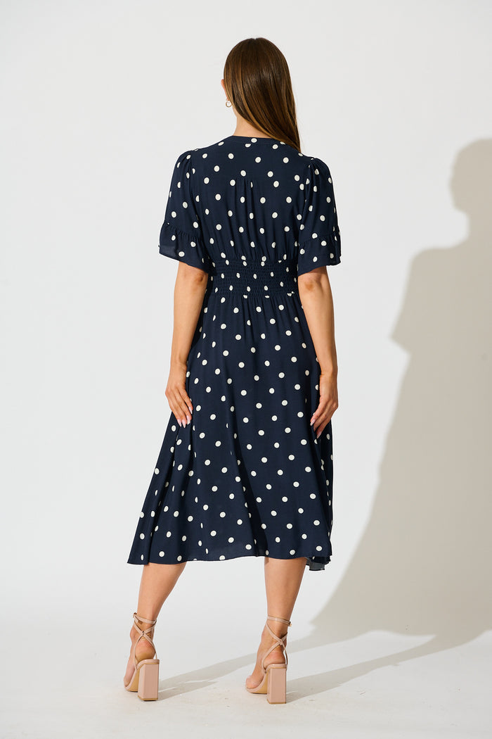 Noree Midi Dress in Navy with White Polka Dot back
