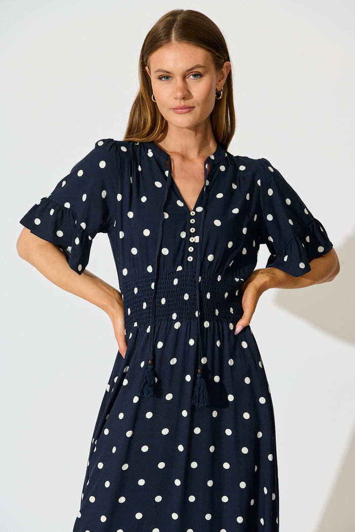 Noree Midi Dress in Navy with White Polka Dot front