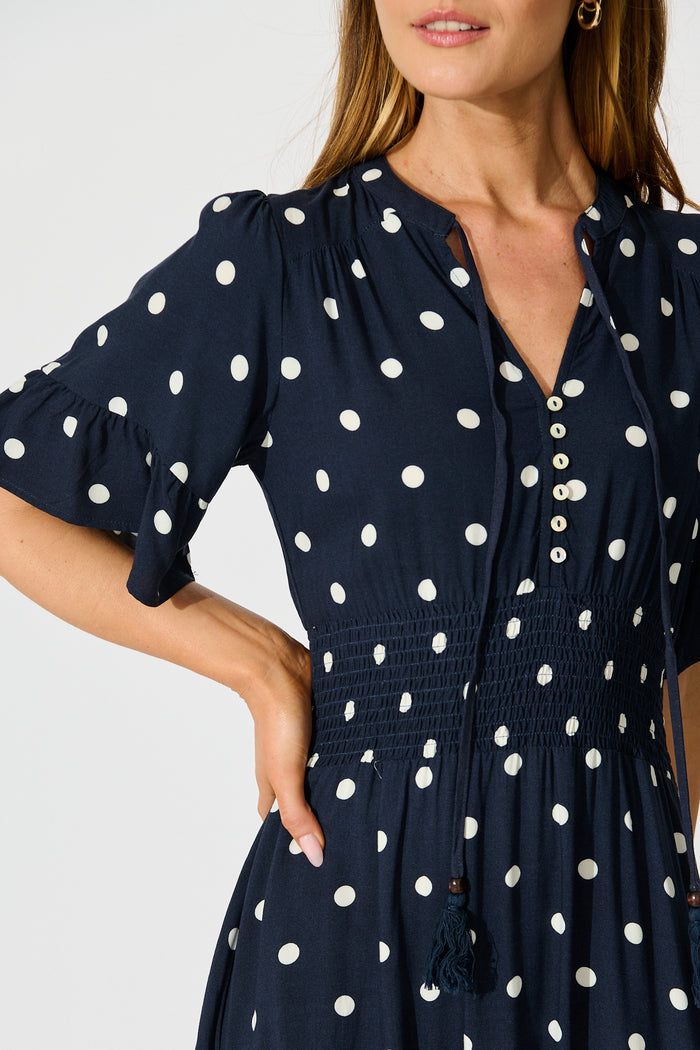 Noree Midi Dress in Navy with White Polka Dot detail