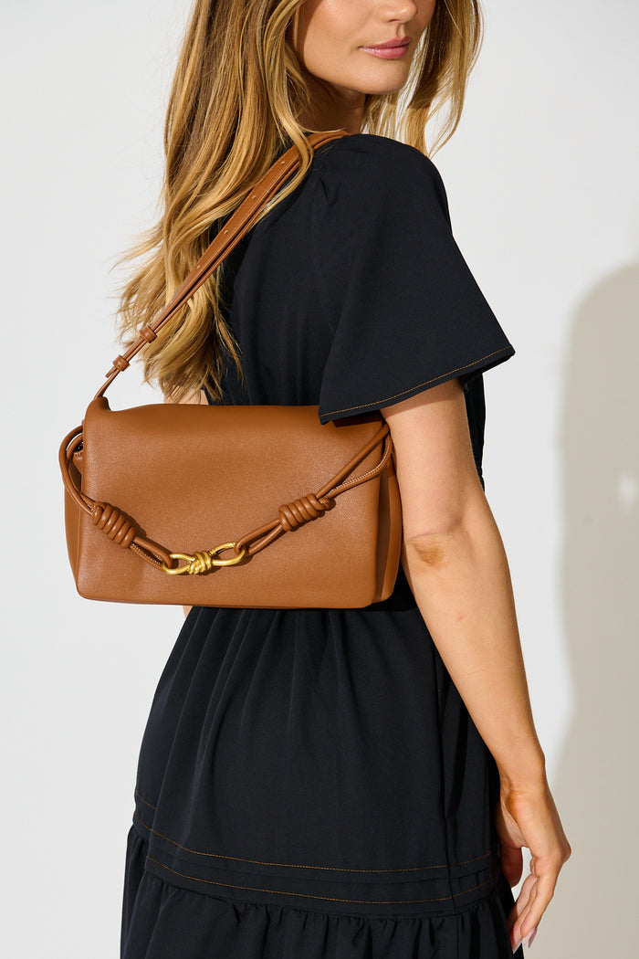 Amy Multiway Bag in Tan on model shoulder