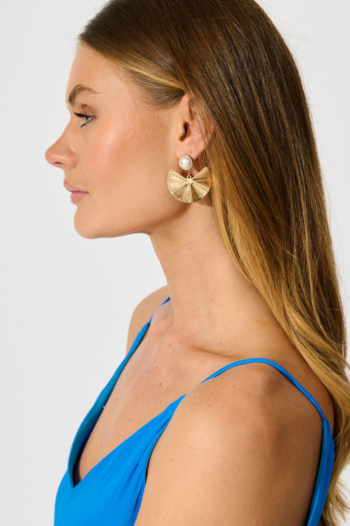 Daphne Drop Earrings in Gold with Pearl on model side