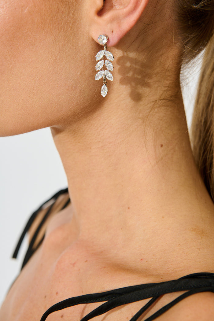 Timeless Drop Earrings in Silver Cubic Zirconia on model side close up