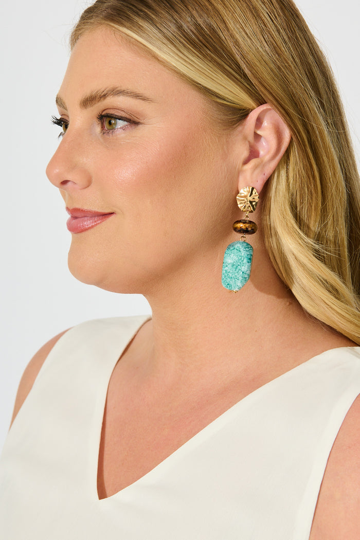 Lana Drop Earrings in Jade Stone with Gold Textured Detail on model side
