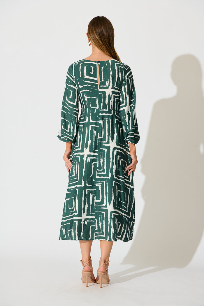 Suzanna Midi Dress in Green Geometric Print back