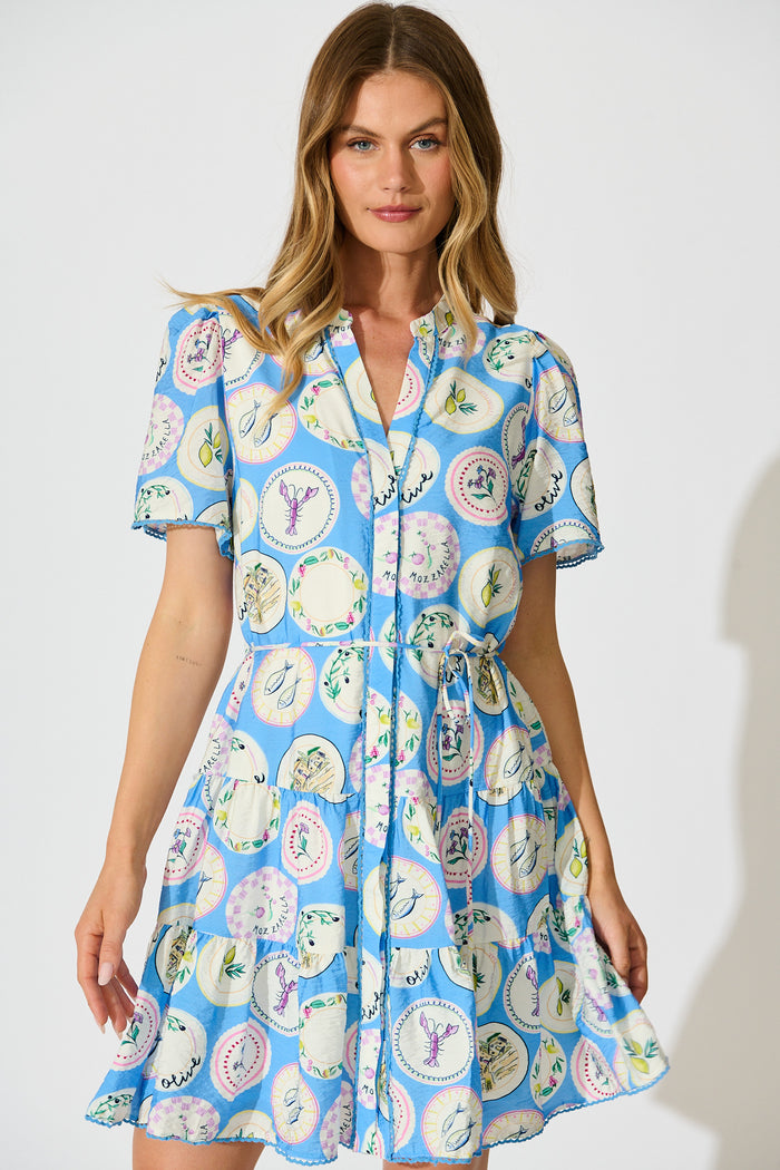 Alessandra Dress in Blue Conversational Print front
