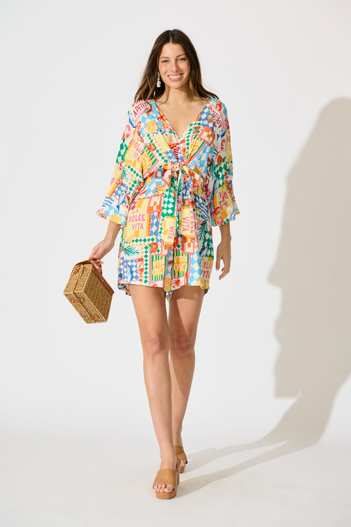 Otillie Playsuit in White Multi Conversational Print full length