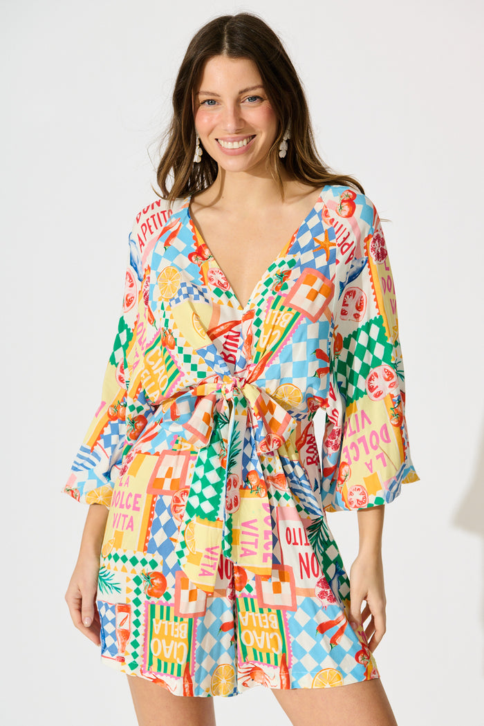 Otillie Playsuit in White Multi Conversational Print front